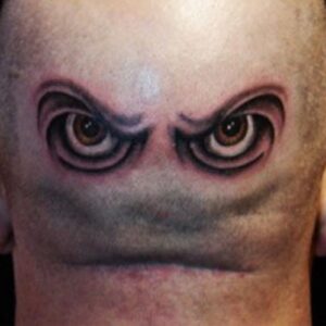 Funny face tattoo