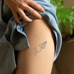 Paper airplane temporary tattoo